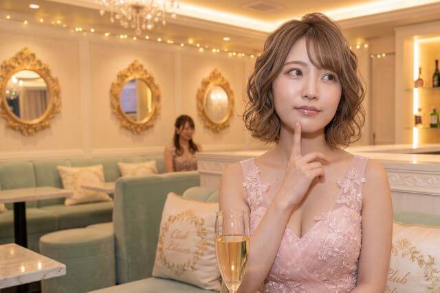 顎に指を当てて横を向くキャバ嬢
